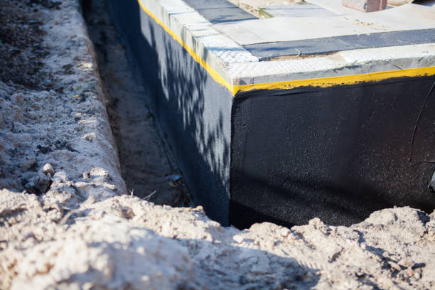 Professional Waterproofing technician working in Fairview, NJ